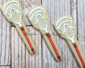 One dozen lacrosse stix decorated sugar cookies - includes writing