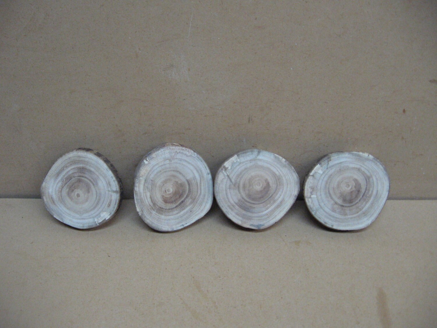 4 small mimosa slices with great color, very hard wood, from CypressClocksThings on Etsy Studio