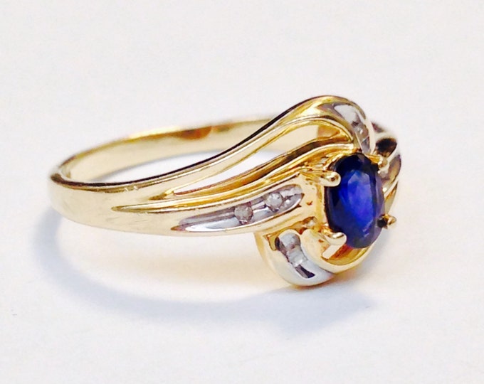 Storewide 25% Off SALE Vintage 10k Gold Deep Blue Faceted Sapphire Ladies Designer Ring Featuring Elegant Diamond Gemstone Accents