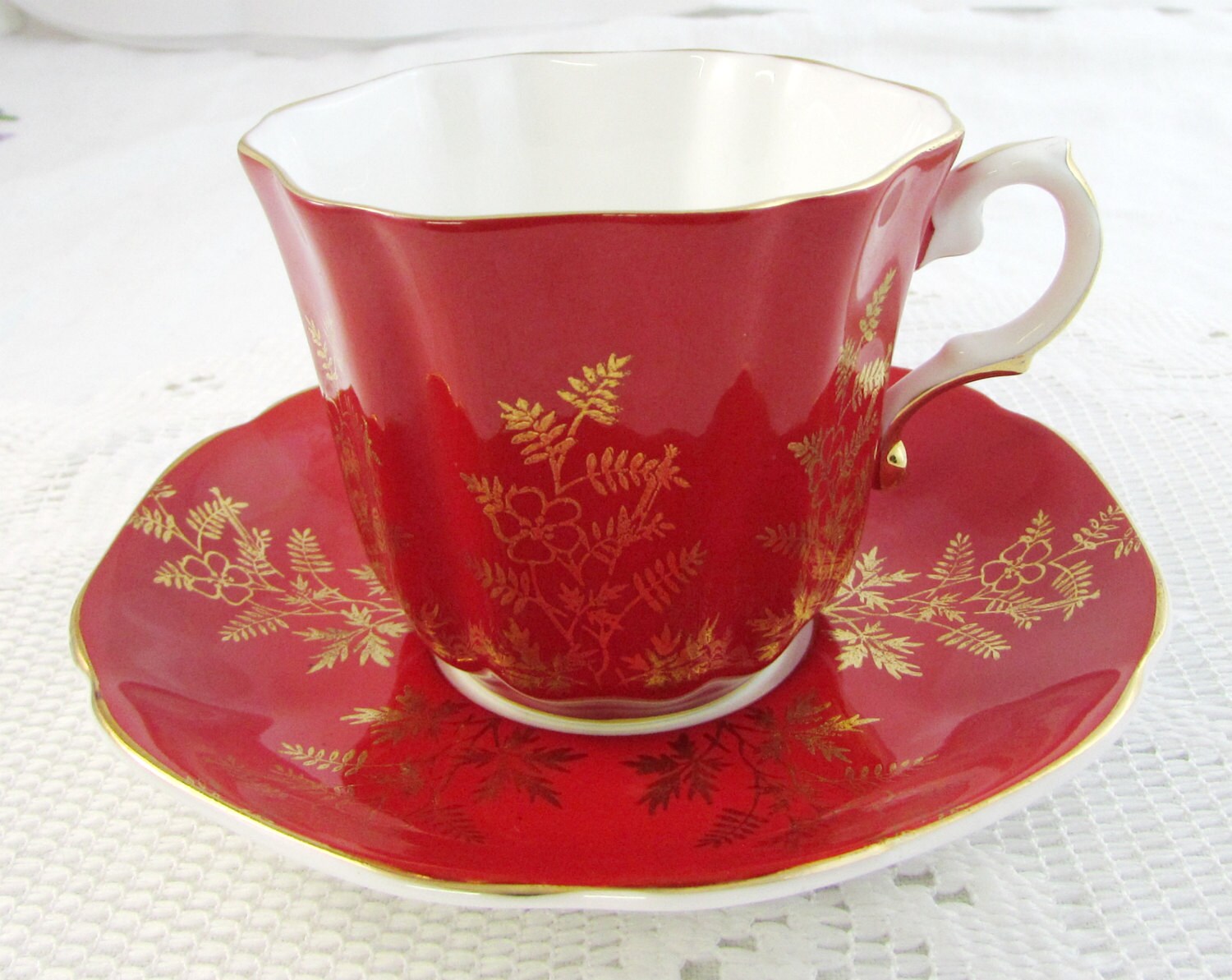 Red Tea Cup and Saucer with Gold Flowers by Royal by TheAcreage