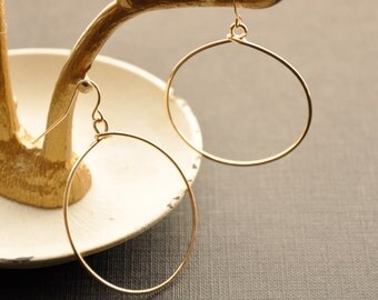 Rose gold dangle hoop earrings Rose gold dangle hoop earrings