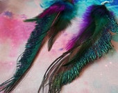 Reserved Turquoise and purple peacock feather earrings