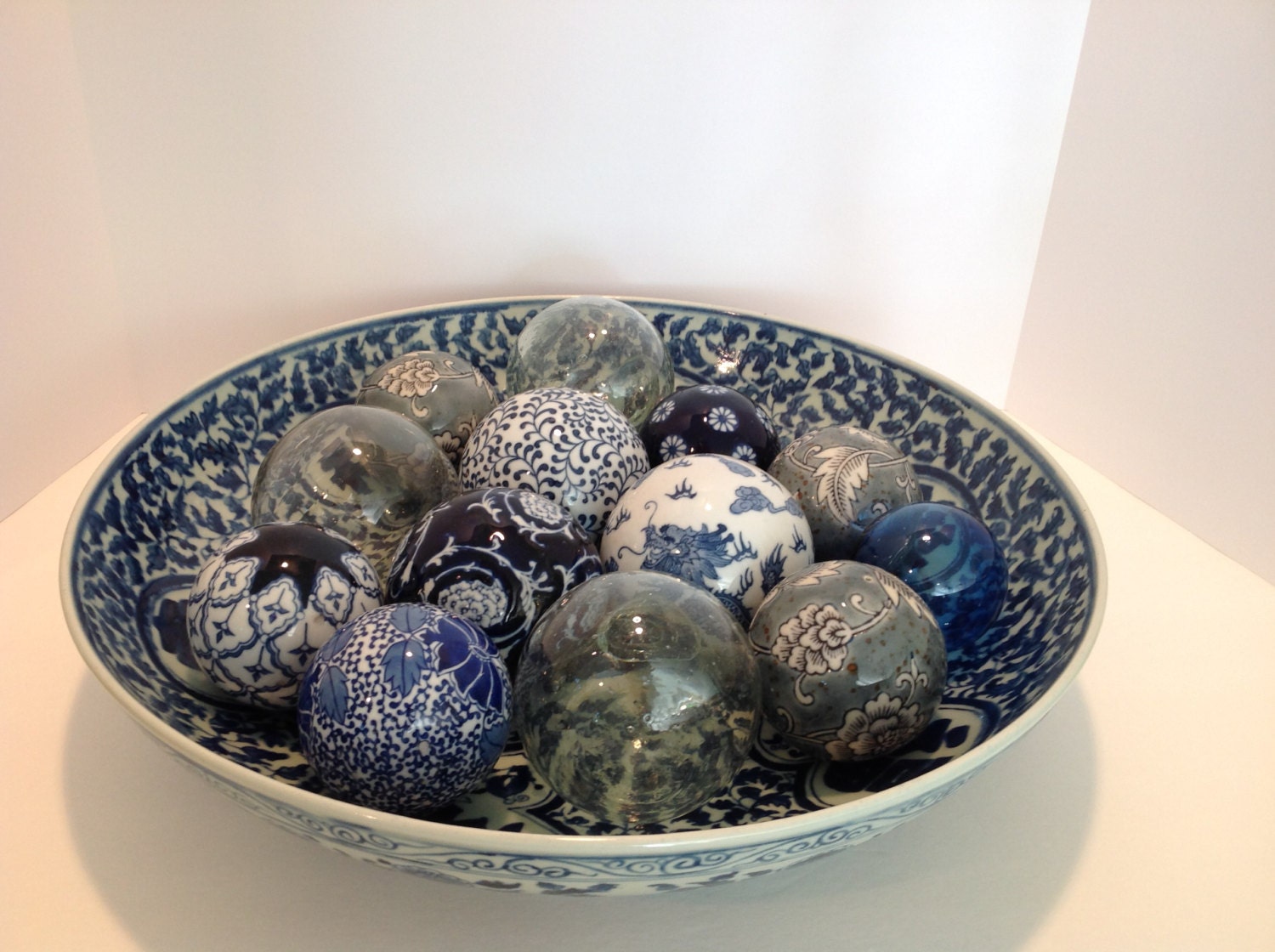 Extra large blue and white bowl with 14 ceramic balls