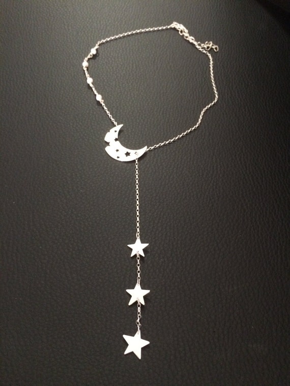 Long necklace of  sterling silver moon and stars. Handmade. Opal glass.