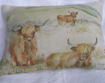 Highland cattle in landscape linen cushion cover.