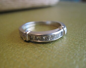 Platinum and White Gold Princess cut Diamond Band