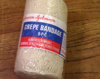 Vintage unused Johnson & Johnson Medical Crepe Bandage, new and sealed unused item.