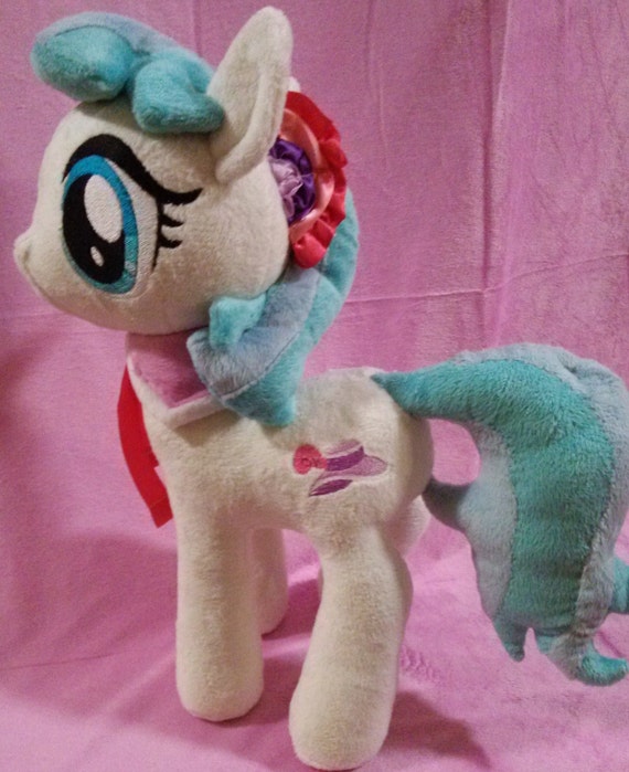 coco pommel plush