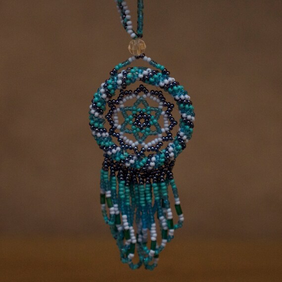 Items similar to Native American Beaded Dream Catcher on Etsy