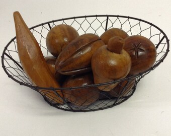 Wire basket full of Hand Carved Vintage Wood Fruit