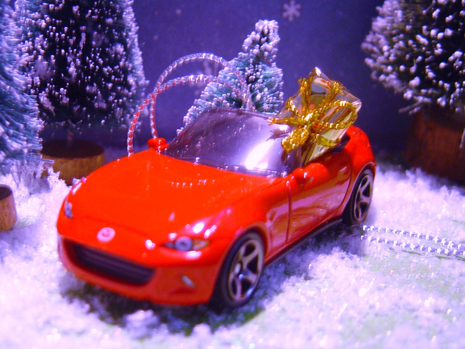 2015 Mazda MX-5 Miata car with Christmas tree ornament