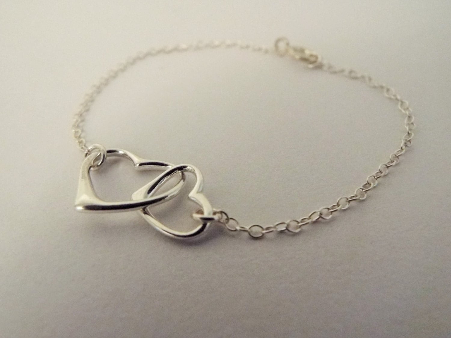 Sterling Silver linked hearts bracelet. Two hearts bracelet.