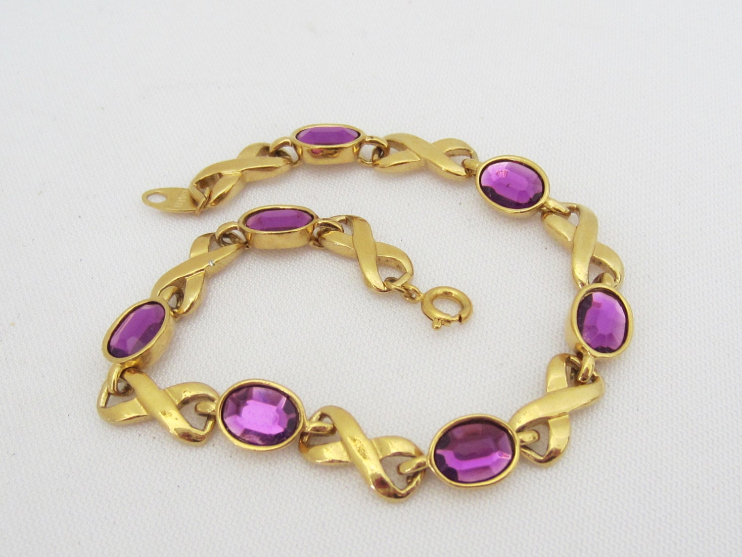 Vintage By AVON Jewelry Gold Tone Purple Rhinestone Link