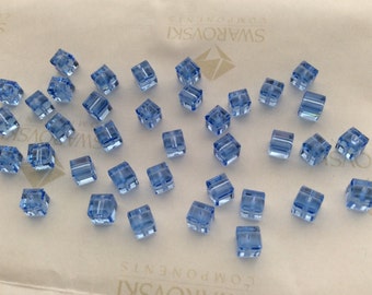 24 pieces Swarovski #5601 4mm Crystal Light Sapphire Cube Square Faceted Beads