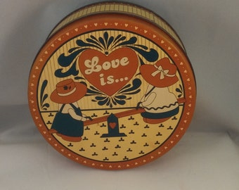 Love Is cannister tin, country tin, farm cookie tin, biscuit tin, yellow and russet country cookie tin, folk style metal tin cannister