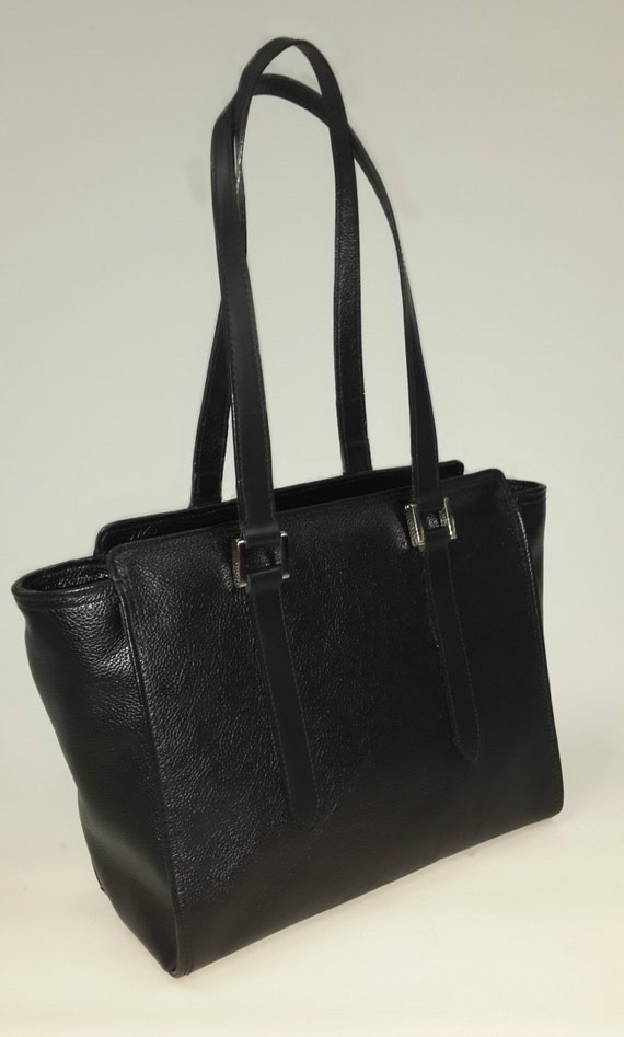 Black shoulder bag with three compartments.