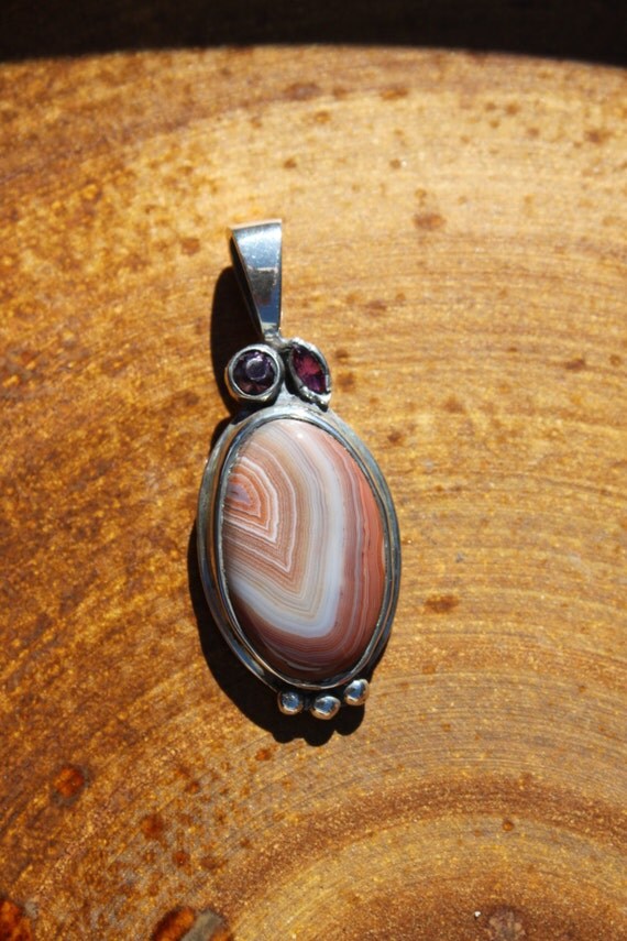 Salmon Colored Lake Superior Agate Pendant With Amethyst Gems