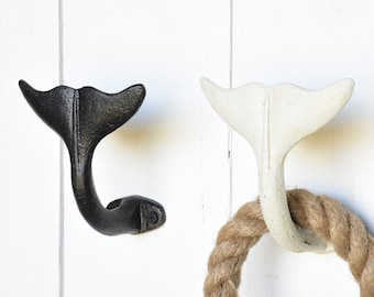 Whale tail hook, whale tail cloths and coat hook. Cast iron black or antique white whale tail wall hooks. Sea decor whale wall hooks