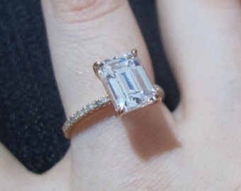 Emerald engagement ring thin band