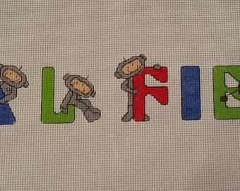 Lovely completed Boys Spaceman Cross Stitch Name Sampler