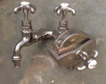 Antique faucet with patented water filter, early 20th century curiosity.