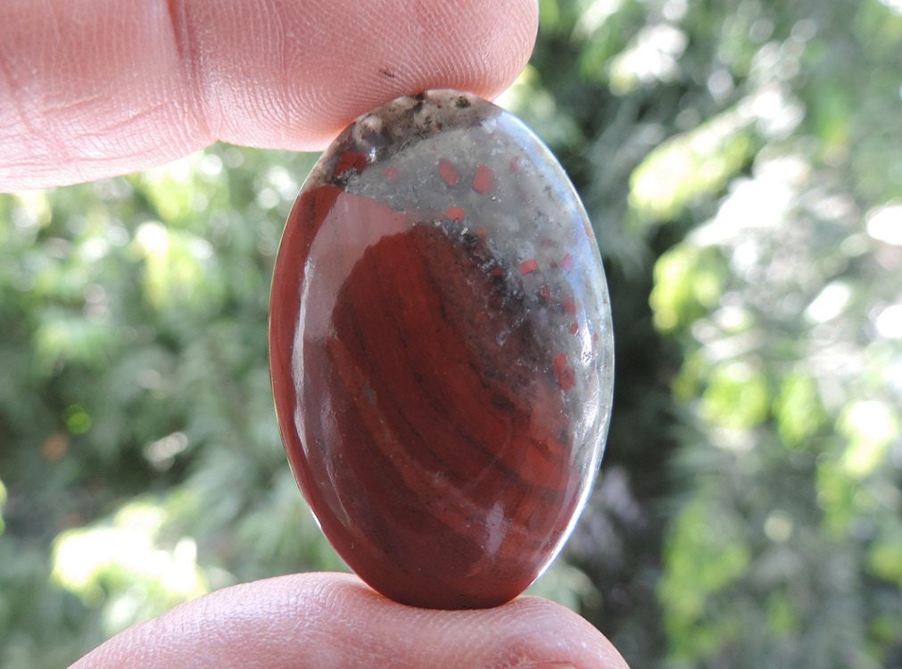 A large Oval Vulcan Jasper/ African Blood Stone Cabochon 38 x