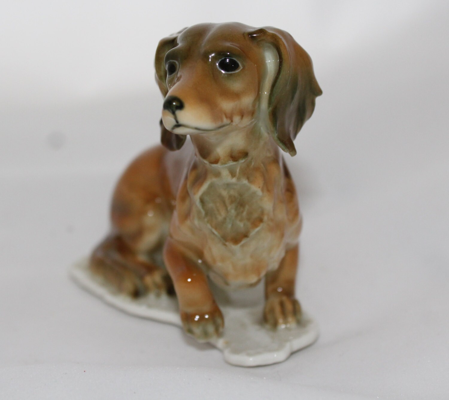 Kaiser Porcelain Longhaired Glazed Dachshund Dog Figurine