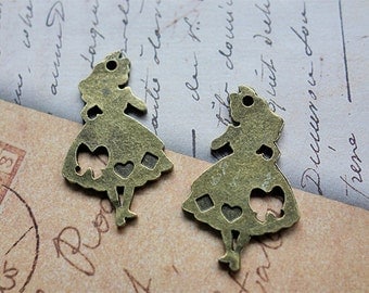 5 pieces Alice in Wonderland Alice charms - Antique bronze