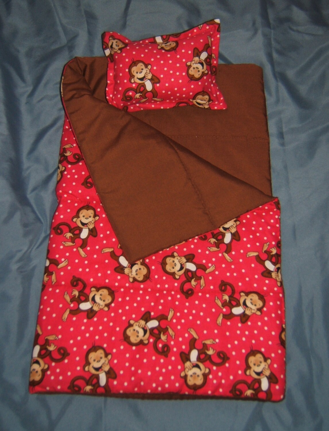 Curious Doll Sleeping Bag in Pink or Green