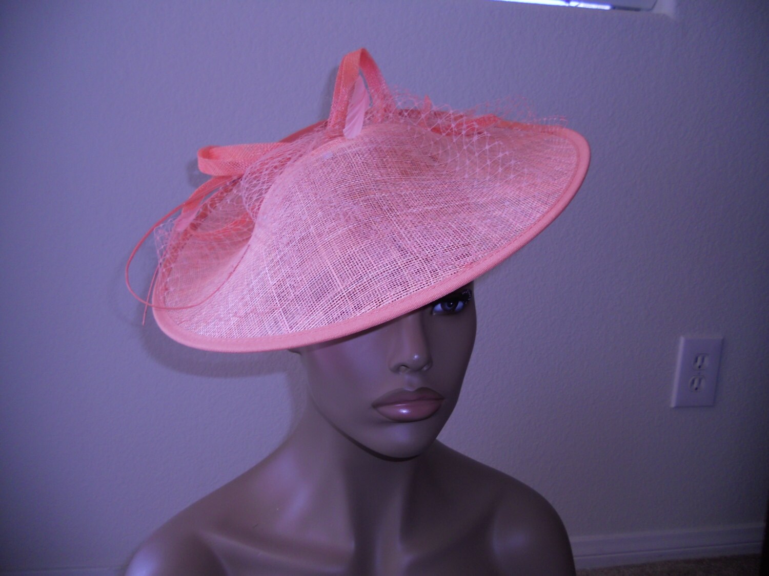 coral coloured wedding hats