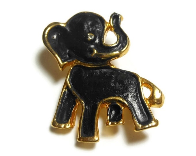 Black elephant brooch pin, small flat black enamel elephant with glossy gold outline, rhinestone eye, the trunk is up for good luck