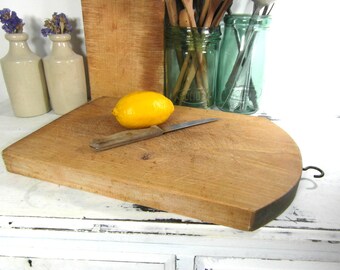 Large, heavy wooden chopping board, butchers block, farmhouse kitchen. French vintage kitchenware, industrial kitchen, French country decor.
