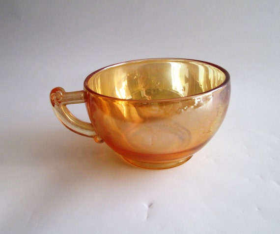 Vintage Iridescent Orange Cup By The Jeanette Glass Company