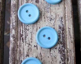 4 Vintage Blue Plastic Buttons