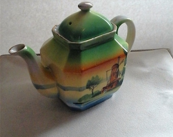 Japanese teapot with windmill scene