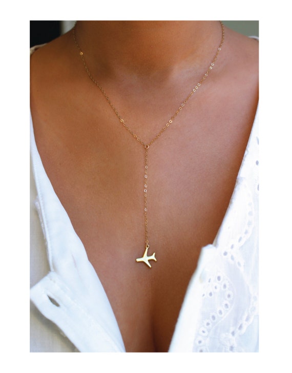 Gold Airplane necklace 