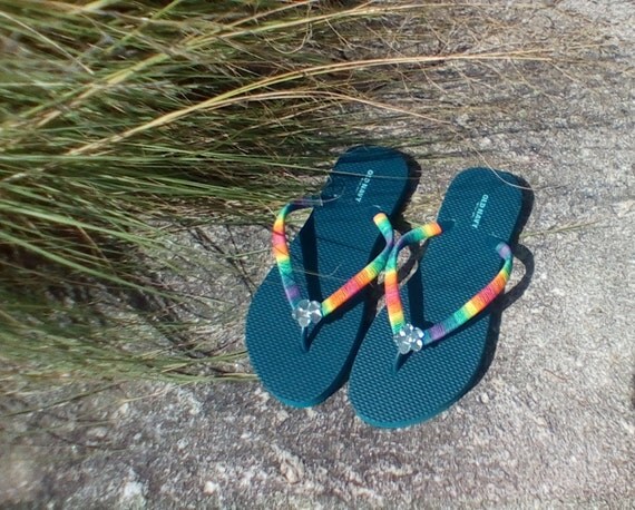 white rainbow flip flops