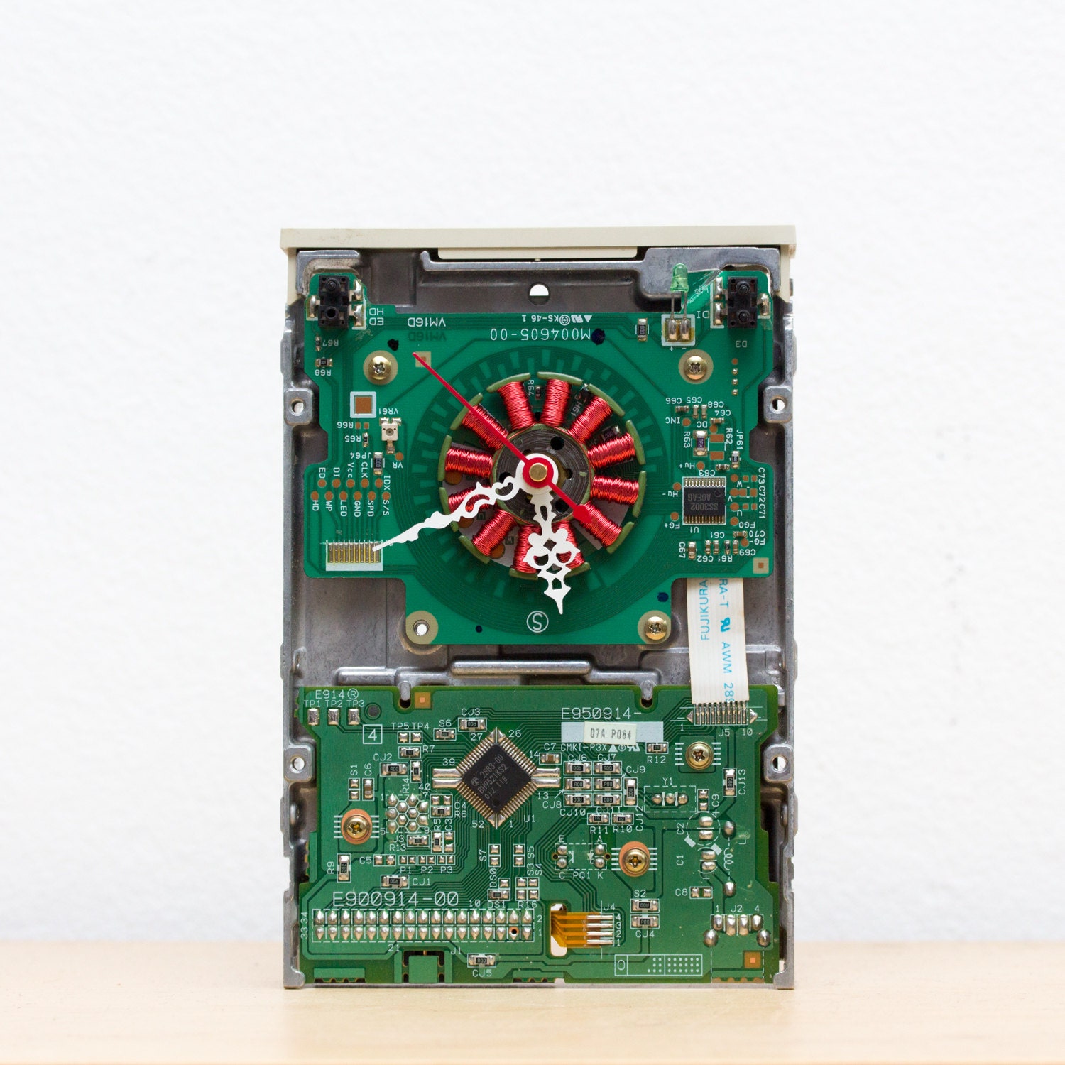 Desk clock made of a 3 1/2 inch floppy disk drive recycled