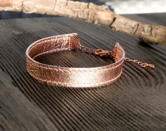 Rosé gold leather strap