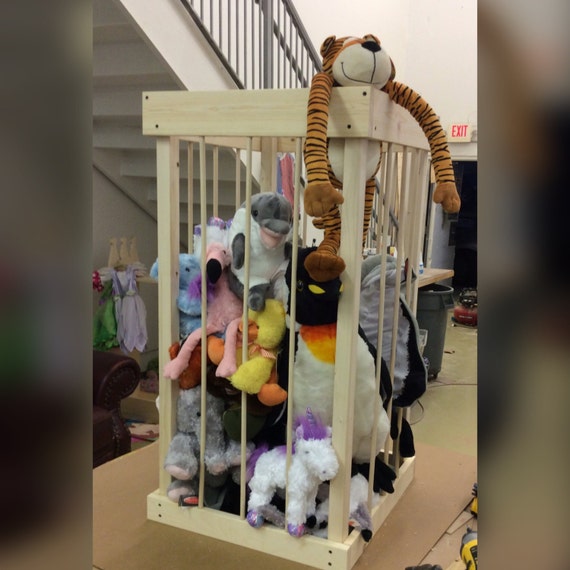 stuffed toy cage