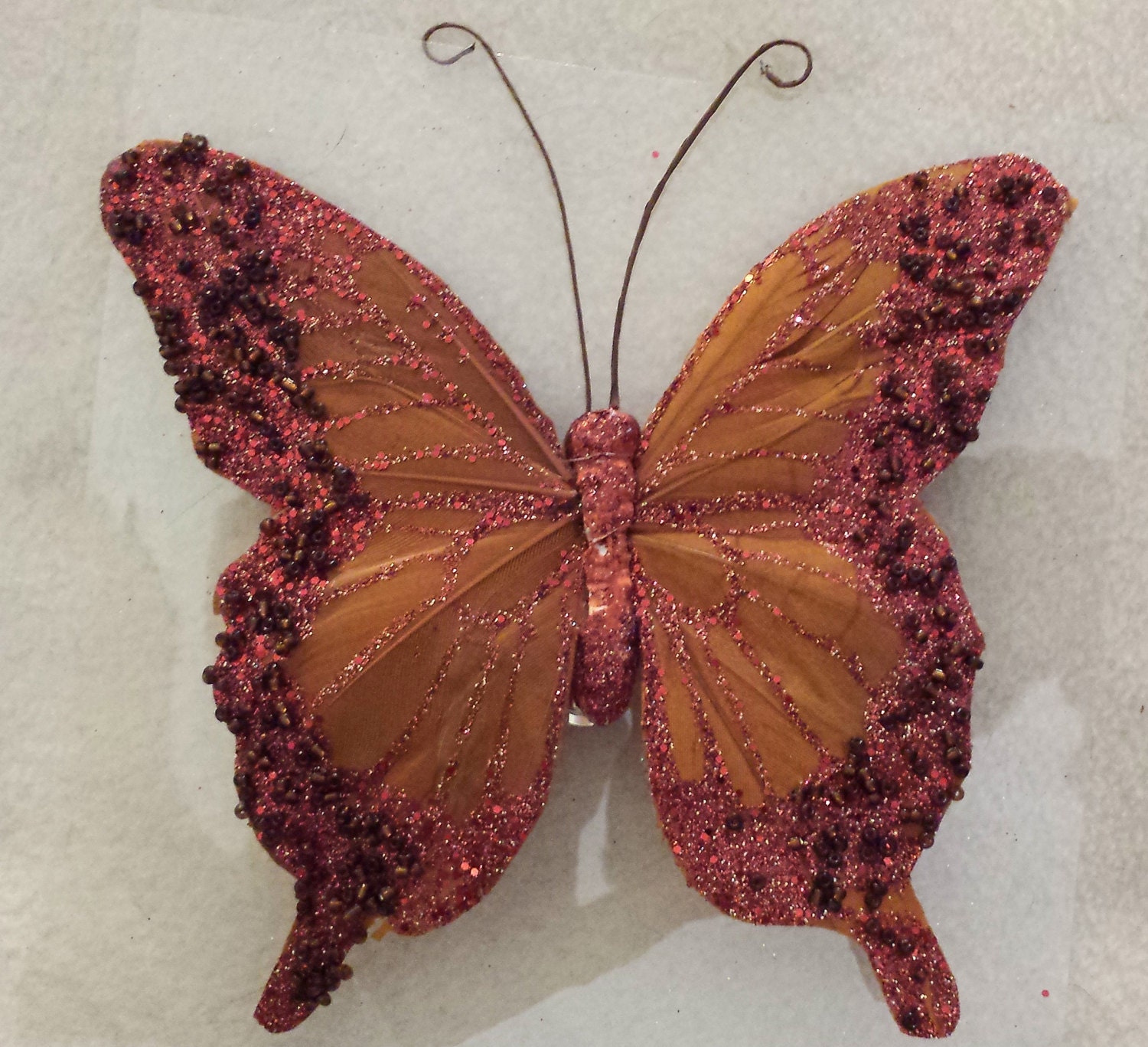 butterfly clip on feathers rust burnt orange dyed red rust