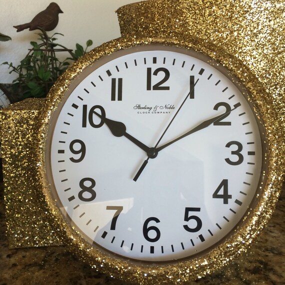 Gold glitter clock matching bathroom accessories