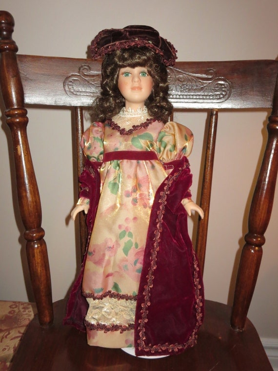 Vintage Porcelain Doll in velvet purple gown by Collectors