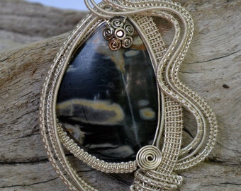 A handmade wire wrapped necklace, silver wire woven around polished stone, wire wrapped jewelry a great gift, pendant has a ball chain