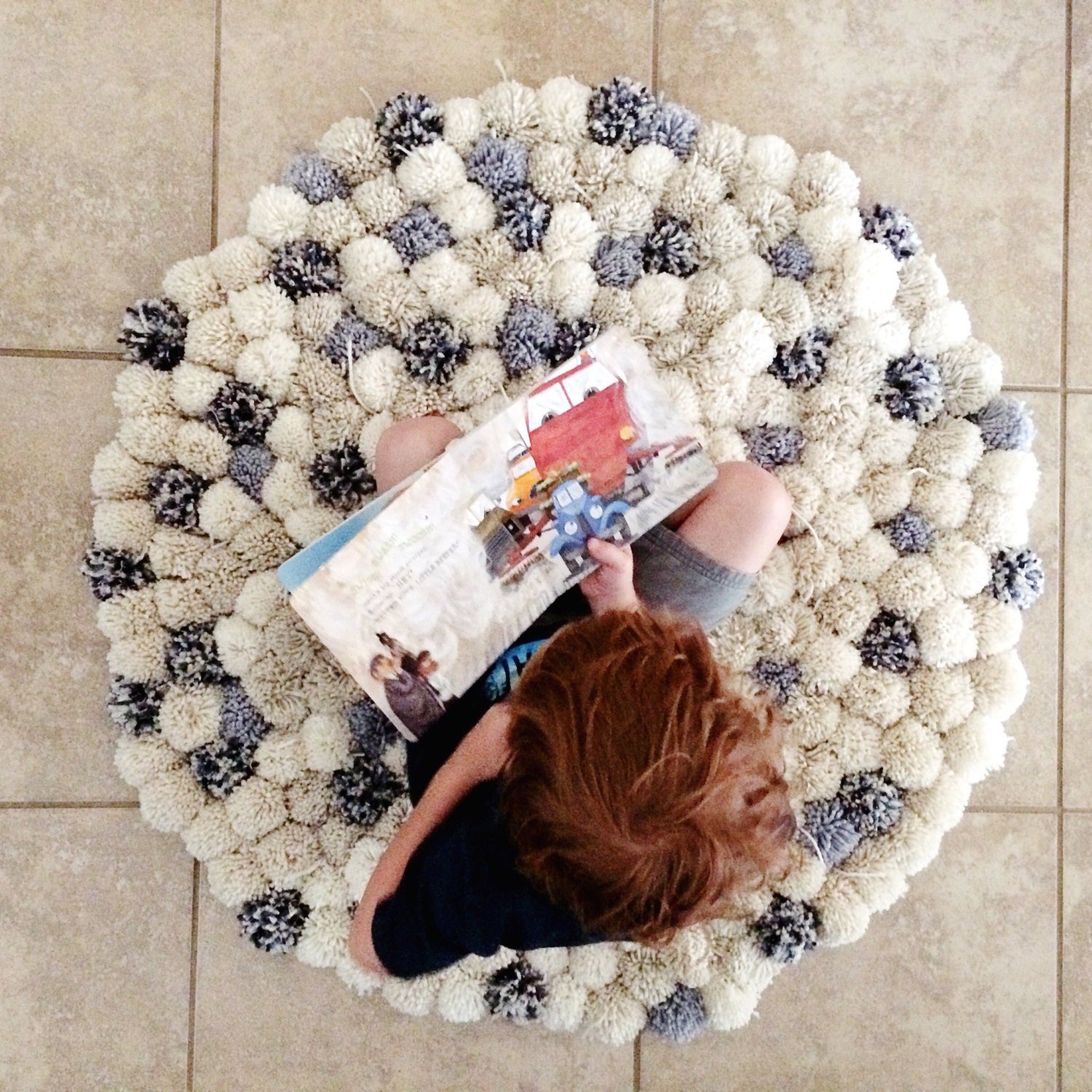 Large round pom pom rug by PaperNursery on Etsy