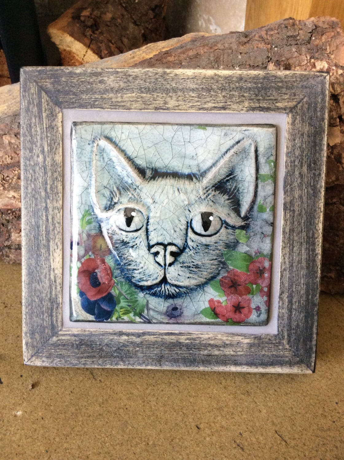 Handmade ceramic  cat  tile  in frame