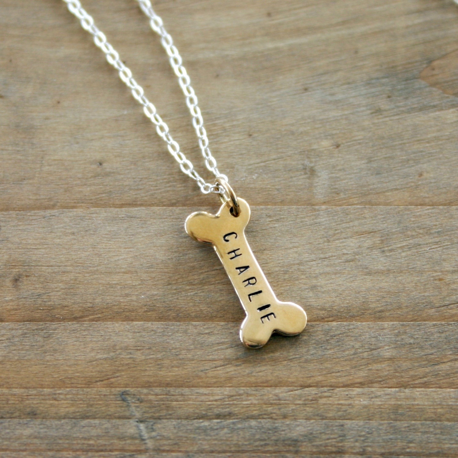 Bronze dog bone necklace with dog name to remember your pet