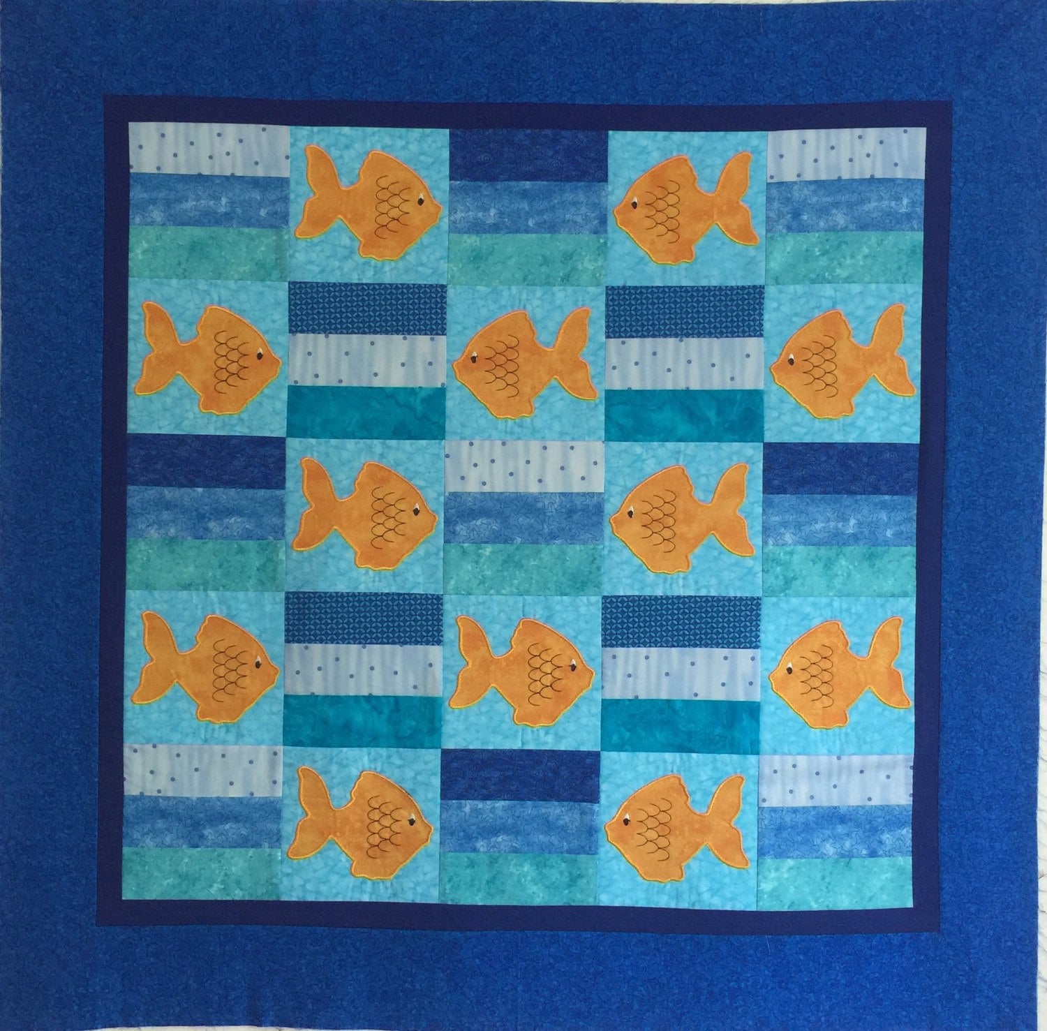 just-keep-swimming-quilt-an-adorable-tropical-fish-themed