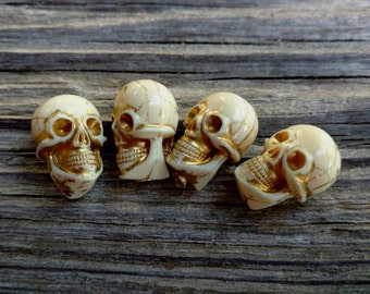 Skull, Pressed Resin, German Made, 15x10mm, Ivory Gold Lined, Priced per Piece