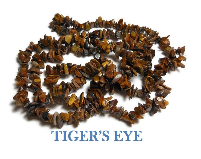 Tiger's eye necklace, medium chip beads, natural semi-precious gemstone, 35 inch strand, chips from small to extra-large, average medium
